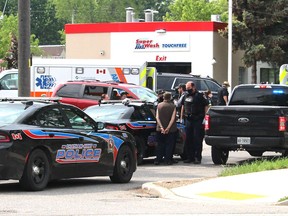Chatham-Kent police and Chatham-Kent EMS were on the scene of an incident on St. George Street near Park Avenue East late Thursday afternoon. Ellwood Shreve Photo/Postmedia
