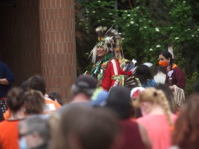 Clinton Soto speaks during a ceremony on Monday night at Grande Prairie City Hall to honour and remember the 215 Indigenous children, whose remains were found in a mass grave site at the Kamloops Residential School. Soto is a Councillor with the Sturgeon Lake Cree Nation.