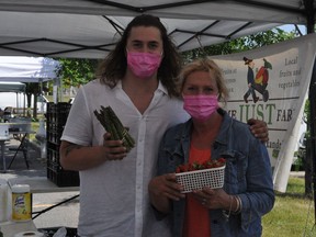 Tyler and Joanne Just of Alexandria's Just Farm, during the first-ever Cornwall Waterfront Farmer's Market, on Sunday June 6, 2021 in Cornwall, Ont. Francis Racine/Cornwall Standard-Freeholder/Postmedia Network