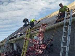Garlow Roofing in Cornwall, will be giving away a free roof on Labour Day weekend to a home in need. The crew can be seen here, working on a site in a photo from the company Facebook page. Handout/Cornwall Standard-Freeholder/Postmedia Network