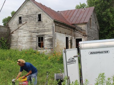 Crewman Bernie Villeneuve doing some set-up work before the video shoot. Photo on Saturday, June 26, 2021, in Summerstown, Ont. Todd Hambleton/Cornwall Standard-Freeholder/Postmedia Network