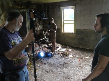Marc Desforges (left) and Sam Franchi doing setup work before the video shoot. Photo on Saturday, June 26, 2021, in Summerstown, Ont. Todd Hambleton/Cornwall Standard-Freeholder/Postmedia Network