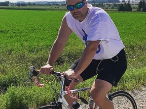 Jeff Burnett is cycling Friday from Milton to Leith in memory of his father Frank, who died on Canada Day last year in Owen Sound from ALS. SUPPLIED