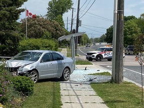 Kingston Police investigating an altercation involving a handgun and a vehicle accident at 1406 Montreal Street. Police are currently searching for the male suspect involved in the altercation. (Steph Crosier/The Whig-Standard)