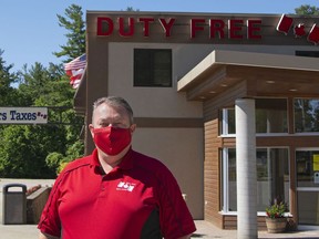 Jeff Butler, owner of the Thousand Islands Duty Free Store, outside his establishment at the Thousand Islands border crossing near Lansdowne on Thursday.