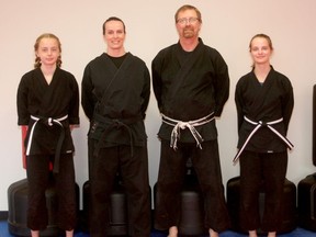Bernardo Karate and Cardio Kickboxing owner Russ Finkbeiner, third from left, is holding an open house for his new Grand Bend location on July 3. Also pictured are his wife Marie, second from left, and their daughters Ava, left, and Lorna, right. Scott Nixon