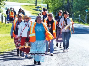 Photo by LESLIE KNIBBS/FOR THE STANDARD
Lead Water Walker Dr. Shirley Williams and other Indigenous walkers in the final stretch to the Spanish Residential Schools on June 20.