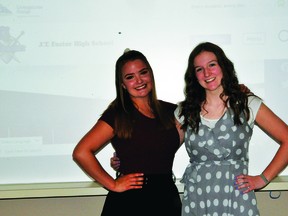 Best friends Claudia Smith, left, and Charlise Ring are J.T. Foster's valedictorians this year and will be giving a joint valedictorian address at Friday's graduation ceremony, which is being held outside, on the school's grounds. The capacity for the ceremony is limited to 150 people due to the current gathering restrictions in the province. Anyone wanting to watch the ceremony, which starts at 2 p.m. on Friday, can do so online via a livestream on J.T. Foster's Facebook page.