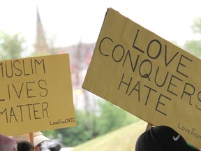 Some of the signs held aloft at a gathering at the Pembroke waterfront Sunday evening, June 13, where the community showed its support of its Muslim members in the wake of a deadly attack against a Muslim family in London, Ont. on June 6 that killed four and left a nine-year-old injured.