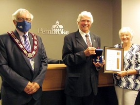 On June 15, Pembroke Mayor Mike LeMay presented the Sovereign's Medal for Volunteers to Romeo Levasseur prior to the city council meeting. Levasseur was joined by his wife Heather.
