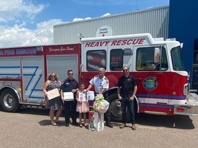From left, Saint Francis of Assisi Catholic school Grade 2 teacher Jody Anne McDonald, Town of Petawawa Fire Department Acting Captain Chris MacDonald, Ontario Association of Fire Chiefs annual Kids Fire Safety Poster Contest grand prize winner Kali Barry, Chief Fire Prevention Officer Simon Brooks, and RONA Petawawa Co-Owner Jean Marc Moncion.