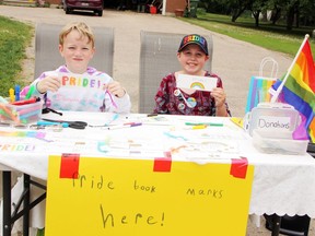 Reece Perry (right), 12, with the help of her cousin Jack Behnke created dozens of Pride bookmarks and sold them with proceeds going to Pflag Canada – Renfrew County.