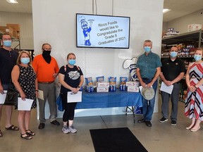 Representatives from eight area elementary schools gathered at Ricco Foods Cash & Carry on June 11 to pick up barbecue meal package certificates for their grade eight graduating students. From left to right: Strathroy Community Christian School's Taylor deSchiffert, Caradoc North School's Cathy Helwig, Ricco Foods owner Don Windsor Sr., North Meadows Elementary School's Kim Lush, Mary Wright Public School's Scott Barker, St. Vincent de Paul Catholic Elementary School's Geoff Moore and Our Lady Immaculate Catholic School's Sue Pellerin. Carl Hnatyshyn/Postmedia Network