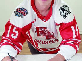 Local product Teegan Dumont signs the Northern Ontario Jr. Hockey League form that officially makes him a member of the Elliot Lake Red Wings. HOCKEY NEWS NORTH