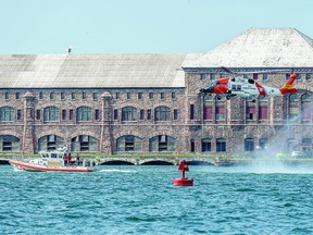 Coast guard, and police marine units do a medevac exercise on the St. Mary's River. BOB DAVIES/SAULT THIS WEEK