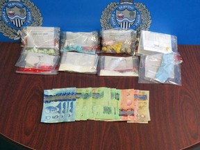 A 31-year-old Sarnia man is facing three drug-trafficking charges after city police say they seized more than $64,000 in drugs and cash. (Sarnia police)