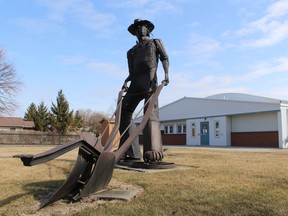 The sculpture Early Morning Down on the Farm stands guard at the Brigden Fairgrounds, one of the locations where the names of inductees into the Lambton Agricultural Hall of Fame are displayed. The hall recent inducted Sid Fraleigh, Dona Stewardson and Kevin Marriott.