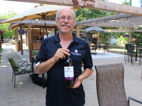 Marc Alton of Alton Farms Estate Winery is shown in the expanded patio at the winery located on Aberarder Line in Plympton-Wyoming. The winery is one of 14 drink establishments listed in the relaunched Cheers to the Coast map via Tourism Sarnia-Lambton. (Paul Morden/The Observer)