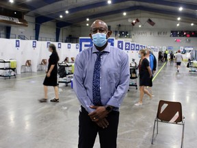 Andrew Taylor, general manager of Lambton County's public health services division, stands inside the new high-volume COVID-19 vaccine clinic at Clearwater Arena as vaccine recipients start to filter in on Friday June 25, 2021, in Sarnia, Ont. Terry Bridge/Sarnia Observer/Postmedia Network