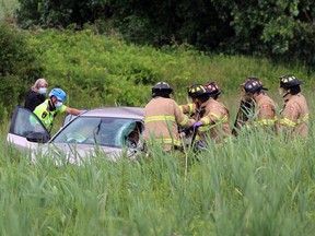 Three people were taken to hospital with what police say were non-life-threatening injuries after a two-car crash on Highway 402 near Modeland Road on Friday June 25, 2021, in Sarnia, Ont. Terry Bridge/Sarnia Observer/Postmedia Network