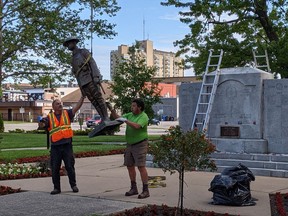 A Canadian "Tommy" statue is removed from the Veterans Park cenotaph in Sarnia June 28, 2021, to be shipped off for repairs. Lighting and security enhancements are planned for the park this summer. (Tom Klaasen photo)