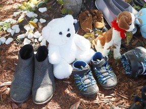 Children's shoes and stuffed toys have been placed at the site of a memorial at the N'Swakamok Native Friendship Centre in Sudbury on June 1 to commemorate the 215 children whose remains were found at a former residential school in Kamloops, BC.