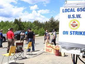 United Steelworkers Local 6500 members picket at the entrance to Vale's Creighton Mine in Greater Sudbury, Ont. on Tuesday June 1, 2021. John Lappa/Sudbury Star/Postmedia Network