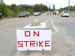 United Steelworkers Local 6500 members picket at the entrance to Vale's Creighton Mine last week. Local 6500 members went on strike Tuesday after rejecting a tentative deal.