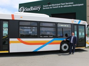 Mayor Brian Bigger shows off one of GOVA's new buses. Supplied photo
