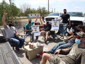 United Steelworkers Local 6500 members picket at one of the entrances to Vale's Garson Mine in Greater Sudbury, Ont. on Wednesday June 2, 2021. The strike began Tuesday after members turned down a tentative agreement with Vale. John Lappa/Sudbury Star/Postmedia Network