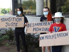 Fridays for Future Greater Sudbury climate activists Sophia Mathur, left, Jane Walker and Arik Kabaroff-Scott held a small rally outside city hall on June 4, during World Environment Day. The activists are urging the city to endorse the Fossil Fuel Non-Proliferation treaty.