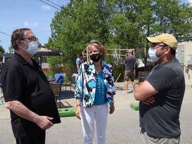 Former United Steelworkers international president Leo Gerard, left, and Nickel Belt MPP France Gelinas talk with striking United Steelworkers Local 6500 member John Benevides at a picket line in Copper Cliff, Ont. on Friday June 4, 2021. Gelinas, Gerard and Sudbury MPP Jamie West visited striking workers to offer their support. John Lappa/Sudbury Star/Postmedia Network