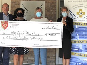 Michael DiBrina (left), Rosemary DiBrina, Celia Teale, chair of St. Joseph's Foundation, and Jo-Anne Palkovits, CEO of the CEO of St. Joseph's Health Centre. The DiBrina family has donated $100,000 to Caring Beyond Capital Campaign. Supplied