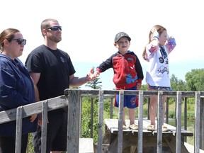Michael and Samantha Bowerbank and their children, Lilly, 5, and Benjamin, 3, take in the sites at Fielding Memorial Park in Greater Sudbury, Ont. on Wednesday June 16, 2021. John Lappa/Sudbury Star/Postmedia Network