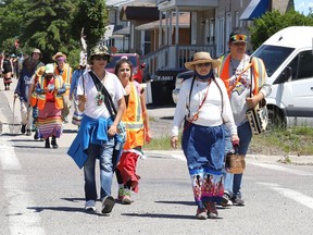 First Nations people take part in a ceremonial Water Walk on June 16. Water Walker and conductor of the walk, Tasha Beeds, led walkers on a 135-kilometre journey to Spanish, where a private ceremony was held. Participants began their journey in Garson.