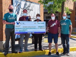 The 2021 SudburyROCKS!!! Marathon raised $71,930 for the Northern Cancer Foundation. Ryan Matusch (left), brother of SudburyROCKS!!! co-founder Steve and vice-president of Equipment North, a $10,000 sponsor); Vince Perdue, SudburyROCKS!!! co-founder; Tannys Laughren, executive director, Northern Cancer Foundation; Anthony Keating, president and chief development officer of Foundations;and Volunteer Groups at HSN; and Andre Dumais, president of Ionic Mechatronics.