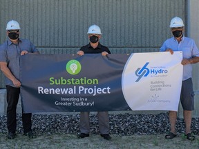 Greater Sudbury Hydro vice-chair René Lapierre, board chair Mark Signoretti and Ward 11 Coun. Bill Leduc celebrate the on time/on budget renewal of the Gemmell Substation in New Sudbury. Supplied