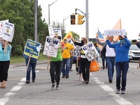 Community members held a rally for striking Steelworkers Local 6500 members at the intersection of The Kingsway and Barrydowne Road in Sudbury, Ont. on Thursday June 24, 2021. John Lappa/Sudbury Star/Postmedia Network