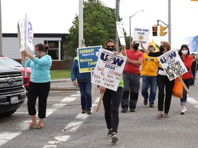 Community members held a rally for striking Steelworkers Local 6500 members at the intersection of The Kingsway and Barrydowne Road in Sudbury, Ont. on Thursday June 24, 2021. John Lappa/Sudbury Star/Postmedia Network