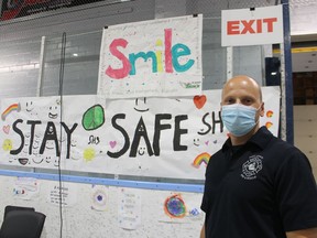 Claudio Palleschi, emergency management coordinator for Point Edward, stands in the village arena where he spearheaded an effort to decorate it with art by local school children while it is being used for a mass COVID-19 immunization clinic. Paul Morden/Postmedia Network