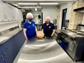 Kiwanis Club of Forest members Betty Fitchett and Joan Rawlings stand in the Kineto Theatre's recently renovated kitchen where they will be preparing food for the club's Curbside Pickup Strawberry Dinner on June 18. Handout/Sarnia This Week