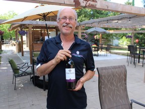 Marc Alton of Alton Farms Estate Winery is shown in the expanded patio at the winery located on Aberarder Line in Plympton-Wyoming. The winery is one of 14 drink establishments listed in the relaunched Cheers to the Coast map via Tourism Sarnia-Lambton. Paul Morden/Postmedia Network