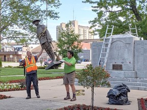 A Canadian "Tommy" statue is removed from the Veterans Park cenotaph in Sarnia on June 28 to be shipped off for repairs. Lighting and security enhancements are planned for the park this summer. (Tom Klaasen photo)