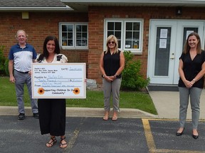 Noelle's Gift's Nicole Paquette and Cathy Robertson receive a cheque from Carpenters Union Local 1256 and Fleck Law in support of their Count Your K's in May fundraiser, which raised $60,001. From left to right: Carpenters Union Local 1256's Bob Schenck, Nicole Paquette, Cathy Robertson and Fleck Law's Catherine Wilde.