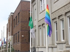 The Pride flag is seen among those lowered in front of city hall this week in memory of the 215 children whose remains were found in a mass grave at a former residential school site in Kamloops last week.

RICHA BHOSALE/The Daily Press