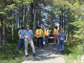 Representatives from Lake Shore Gold Corp., Wintergreen Fund for Conservation and Mattagami Region Conservation Authority checking on work being completed along the Golden Springs recreational trail. From left, Kees Pols, Wintergreen director, Dave Vallier, MRCA manager, Kevin Gagnon, MRCA field supervisor, Branden Dubosq, student, Brad Bonsall, student, Marcel Cardinal, director of environmental and sustainability with Lake Shore Gold.

Supplied