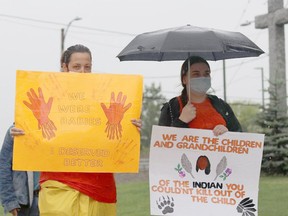 About a dozen people came to St. Anthony of Padua Cathedral in Timmins Sunday to raise awareness about residential schools and demand answers about the thousands of Indigenous children who attended these schools and never returned home.

Dariya Baiguzhiyeva/Local Journalism Initiative