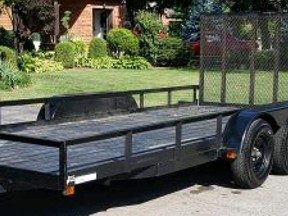 Oxford OPP is investigating the theft of a 2009 black Sure flat deck trailer from a Spruce Street address in Tillsonburg. (Submitted/OPP Photo)