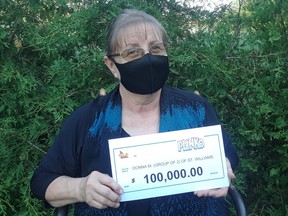 Donna Mago and her husband Matthew of St. Williams have won $100,000 on an Instant Plinko lottery ticket. PHOTO BY OLG /Contributed