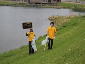 During the annual clean up, Al Zablockas and his son Mantis managed to find an old election sign that had been discarded in the lake..TP.JPG